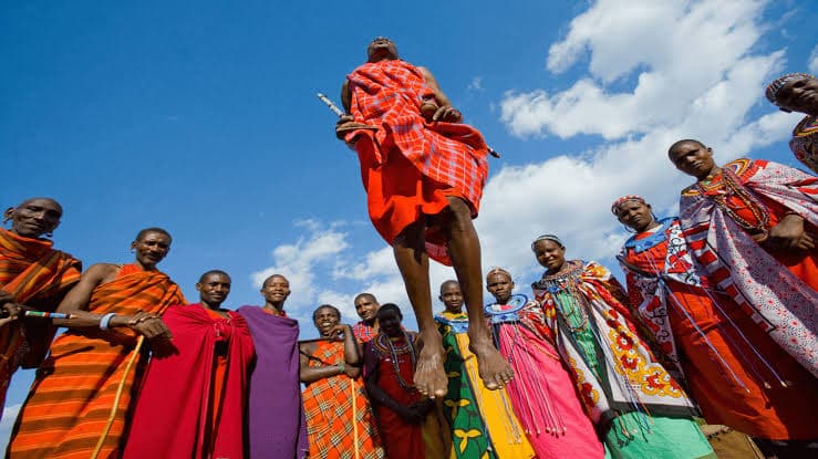 Maasai community members performing a traditional jumping dance